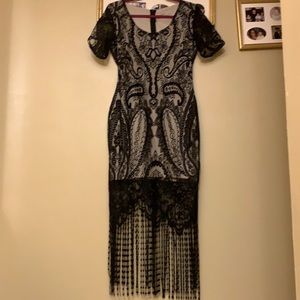 Dress. Black lace over beige slip
